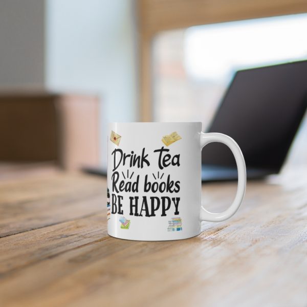 65216-11.jpg Drink tea bookish mug